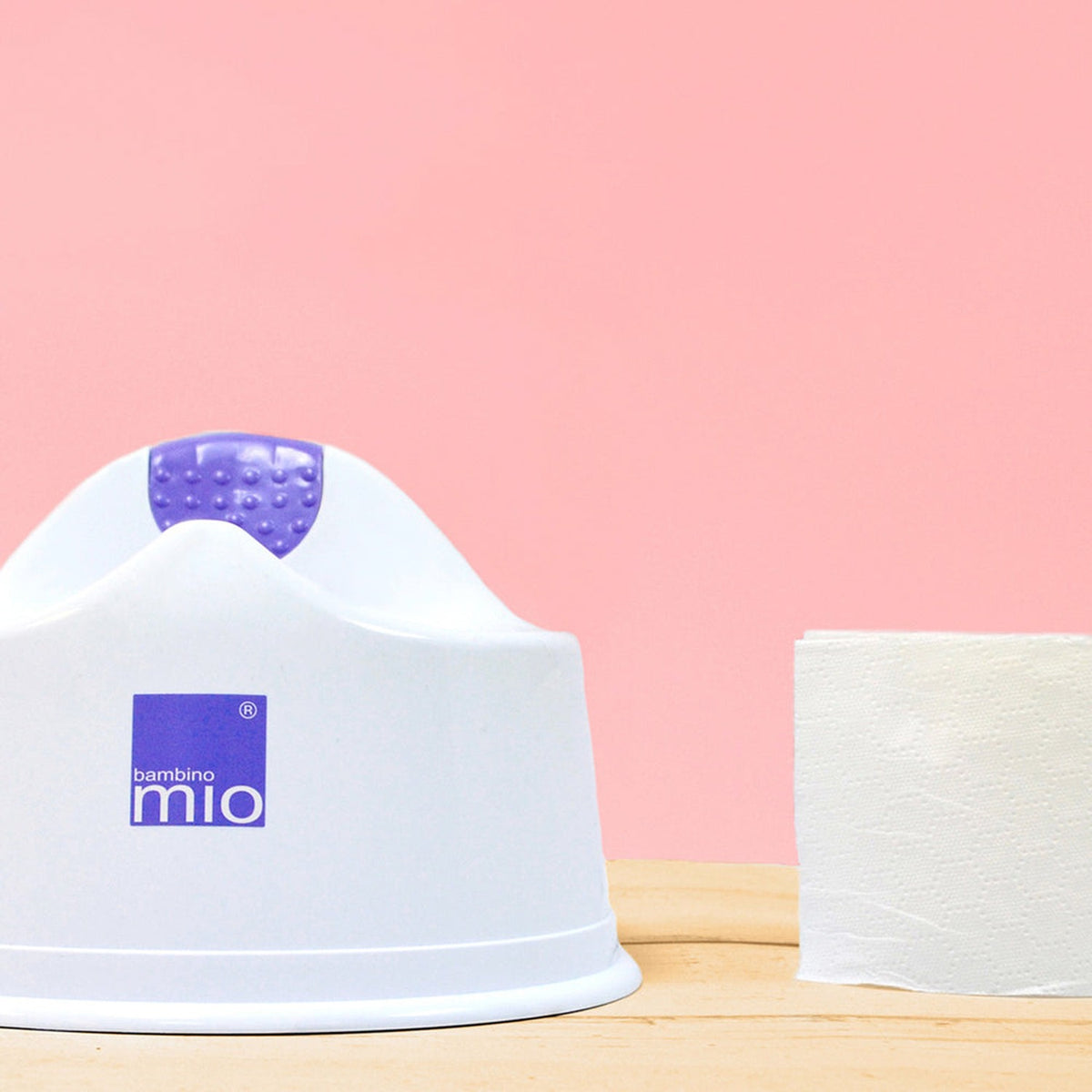 Bambino Mio Töpfchen MioPotty vor rosa Hintergrund