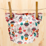 Culla di Teby Höschenwindel mit Pocketfunktion im Design Childhood auf der Wäscheleine (weitere Ansicht)