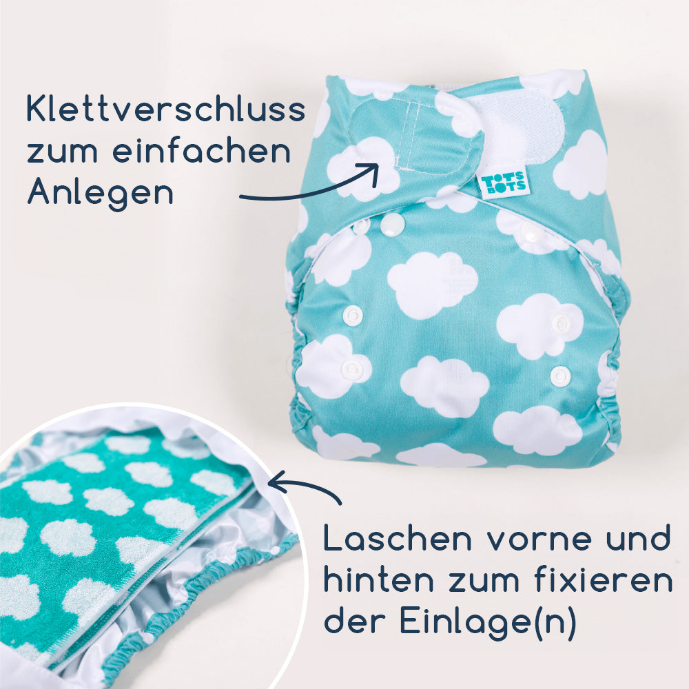 Infografik: TotsBots Bamboozle Wrap mit Klettverschluss zum einfachen Anlegen und Laschen zum Fixieren der Einlage