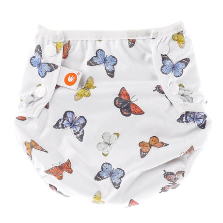 XKKO waschbare Schwimmwindel One Size (4–15 kg) im Design Butterflies (Schmetterlinge) von vorn mit Druckknöpfen