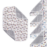 Mehrere XKKO Wickelunterlagen 70 x 50 cm in verschiedenen Designs mit grauer wasserdichter Unterseite